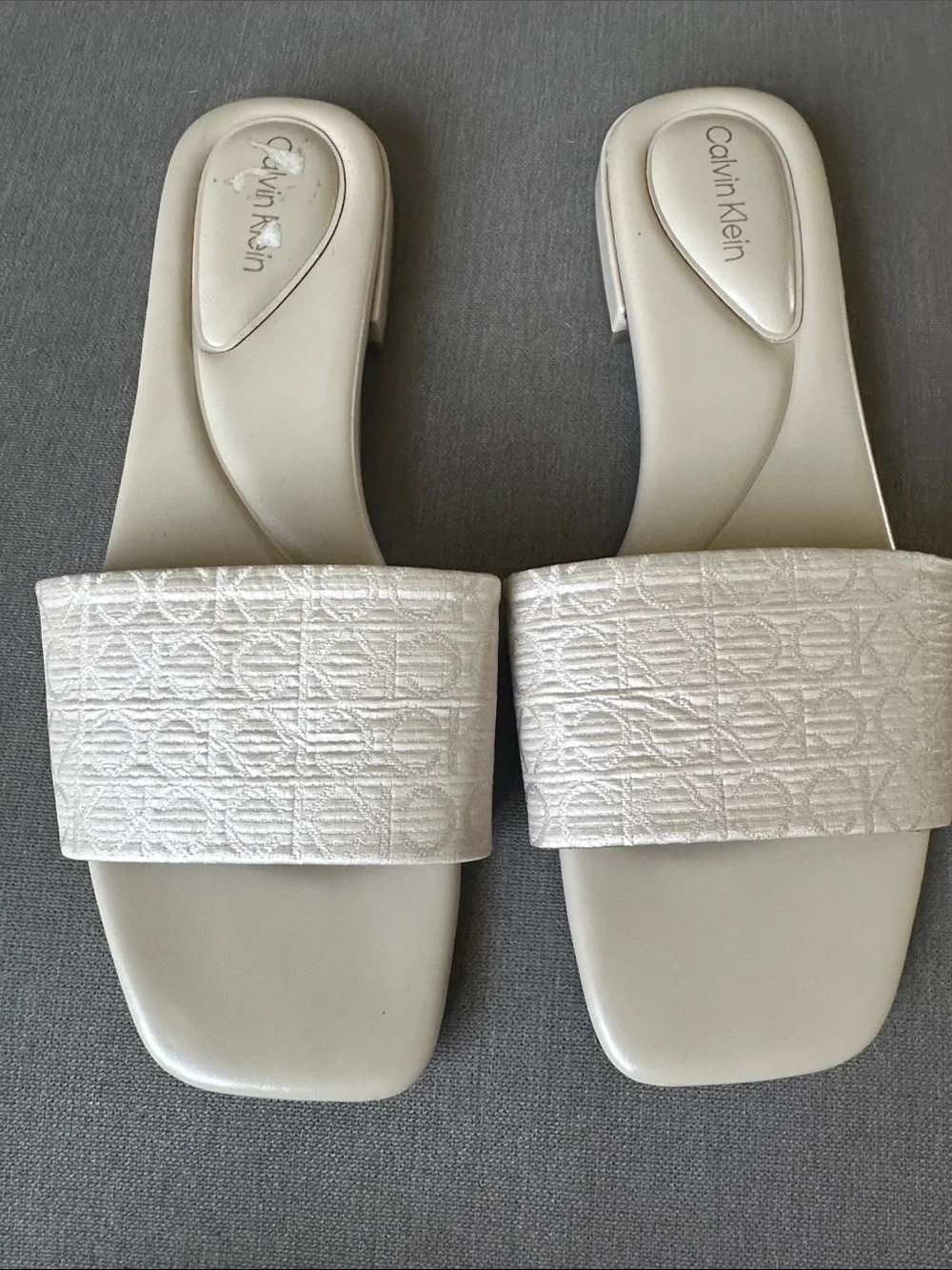Calvin Klein Pearl White Embossed Logo Slide Sandals